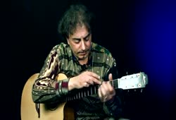 Tapping on acoustic guitar, lesson from Pierre Bensusan